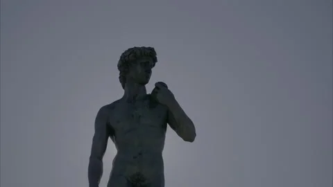 Clip of statue of david michelangelo behind the sun  in florence Stock Footage 298958264