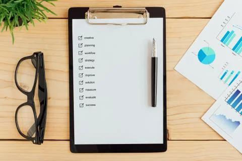 Clipboad and check box on work desk business concept Stock Photos