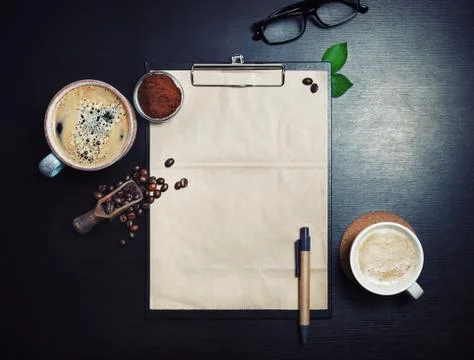 Clipboard and coffee Stock Photos