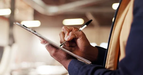 Clipboard, hands and writing with man in carpentry factory for management of Stock Footage 340610097