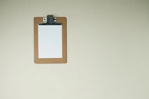 Clipboard with post it notes and smile on the wall. smile concept. clipboard  Stock Photos