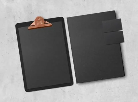 Clipboard with sheets of paper, business cards and folder on concrete background Stock Photos