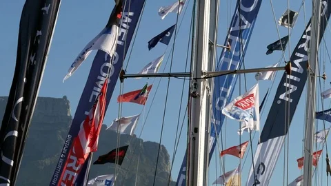 Clipper round world close view flags on ropes with Table Mountain cable car top  動画素材 81450846