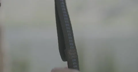 Clipping hammock to strap Stock Footage 65189497