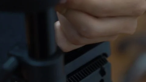 Clipping a studio light onto a light stand Stock Footage 107325670