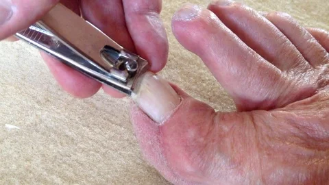 Clipping Toe Nails Stock Footage 75020000
