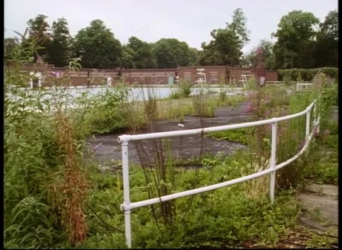 Clips of empty pools in outdoor aquapark with slow piano playing in background Stock Footage 159723462