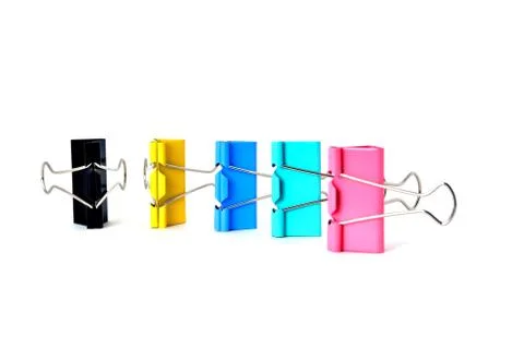 Clips for paper standing vertically on a white background Stock Photos