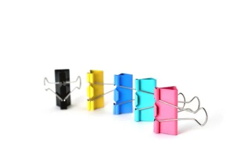Clips for paper standing vertically on a white background Stock Photos