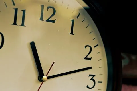 A clock with 11 and 11 on it. Obsolete Round wall clock. time concept Stock Photos
