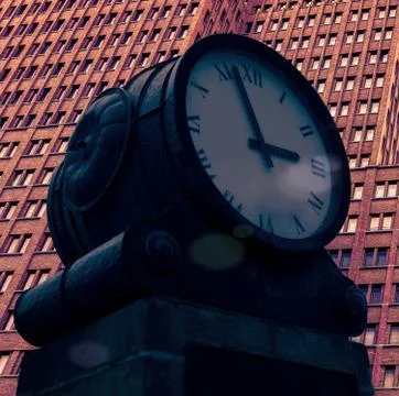 Clock against the building Stock Photos