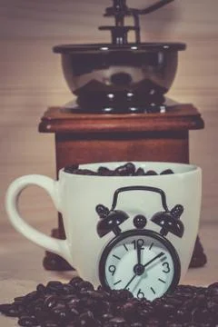 Clock Alarm on Coffee beans Stock Photos