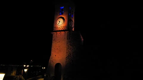 Clock and bell tower of Church of Notre Dame D'esperance at night in Cannes. Stock Footage 247218391