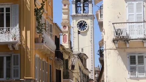 Clock and bell tower in Kerkyra or Corfu Town in the Island of Corfu Ionian Isla Stock Footage 169537029