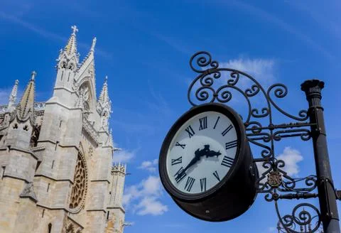 Clock and cathedral tower in Leon Stock Photos