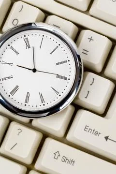 Clock and computer Keyboard Foto stock