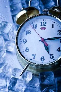 Clock and Ice cubes, fresh and wet vibrant theme Stock Photos