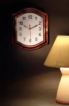 Clock and lamp Stock Photos