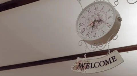 Clock And Welcome Sign Stock Footage 62735105