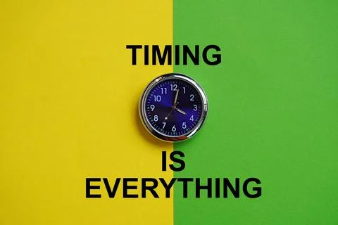 Clock and words timing is everything. Self development concept 스톡 사진
