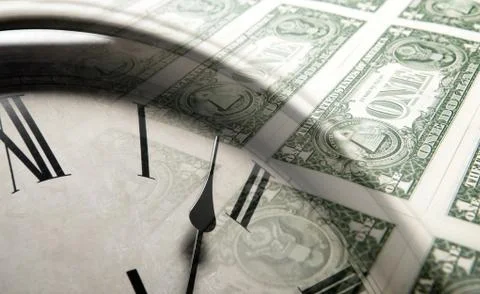 Clock on the background of banknotes dollars Stock Photos