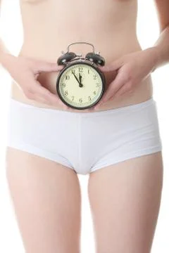 Clock on belly Stock Photos