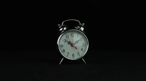 Clock on a black background loop Stock Footage 34660423