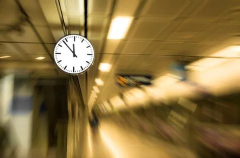 Clock blurred ,conceptual image of time running or passing away effect  zoom  Stock Photos