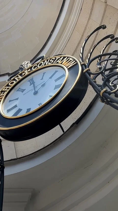 The clock on the building shows 2:00 pm big hang Paris 2023 Stock Footage 244357607