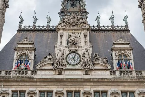 The clock on the central section of the Hotel de Ville, Paris, France Stock Photos