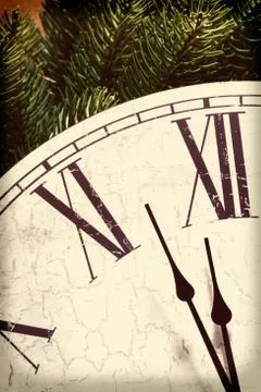 Clock with Christmas decorations Stock Photos