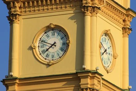 The clock on the city tower Stock Photos