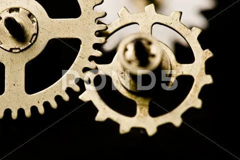 Clock cogs on black Stock Photos