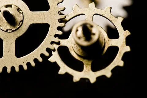 Clock cogs on black Photos