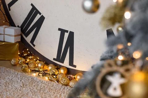 Clock Element with Christmas Theme. Golden New Year's Toys lie on Floor with  Stock Photos