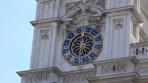 Clock on the facade of Westminster Abbey on a sunny summer day in London, UK Stock Footage 320298143