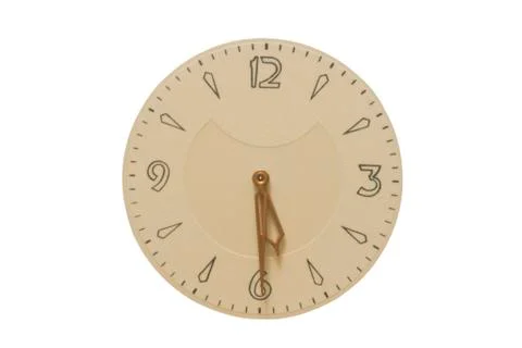 The clock face and hands at half past five. Stock Photos