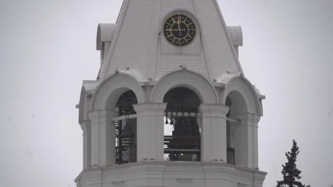 Clock face on the bell tower of a white Orthodox church. Stock Footage 305445430