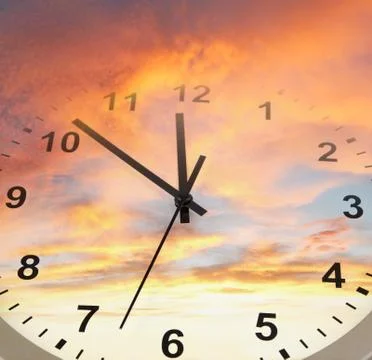 Clock face in bright sky. Time passing Stock Photos