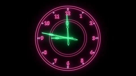 The clock face is purple, the green hands are Arabic numerals, the 9 o'cloc.. Stock Footage 339093467