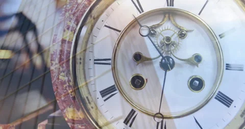 Clock face with Roman numerals over animation of light streaks and reflections Stock Footage 304574206