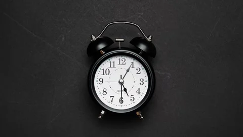 Clock face timelapse on black background. Time ticking on old fashioned clock Stock Footage 329019441
