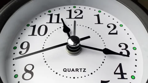 Clock face timelapse on black background. Time ticking on old fashioned clock Stock Footage 329939738