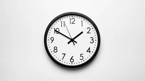 Clock face timelapse on white background. Time ticking on classic wall clock Video stock 295040689