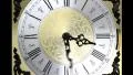 Clock face zoom running backward at speed ornate grandfather time travel HD Footage