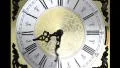 Clock face zoom running at speed ornate grandfather timelapse time travel HD Footage