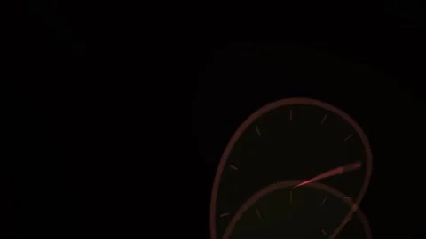 Clock faces in the dark with glowing hands. Stock Footage 335507155