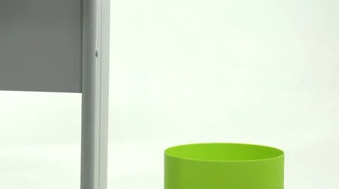 Clock falls in trash can 2 Video stock 10125087