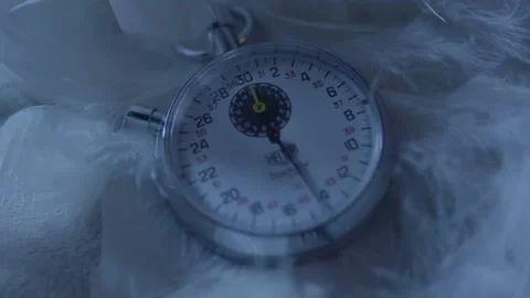 Clock on Feather - Stock Video Stock Footage 202189344