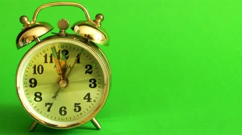 Clock on a green background Vidéo 10913184